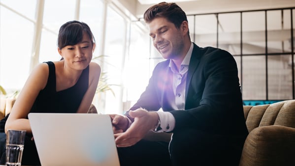 two happy workers in a meeting