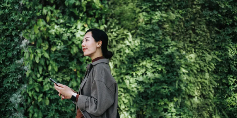 woman in green forest