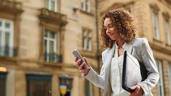 woman looking at phone 