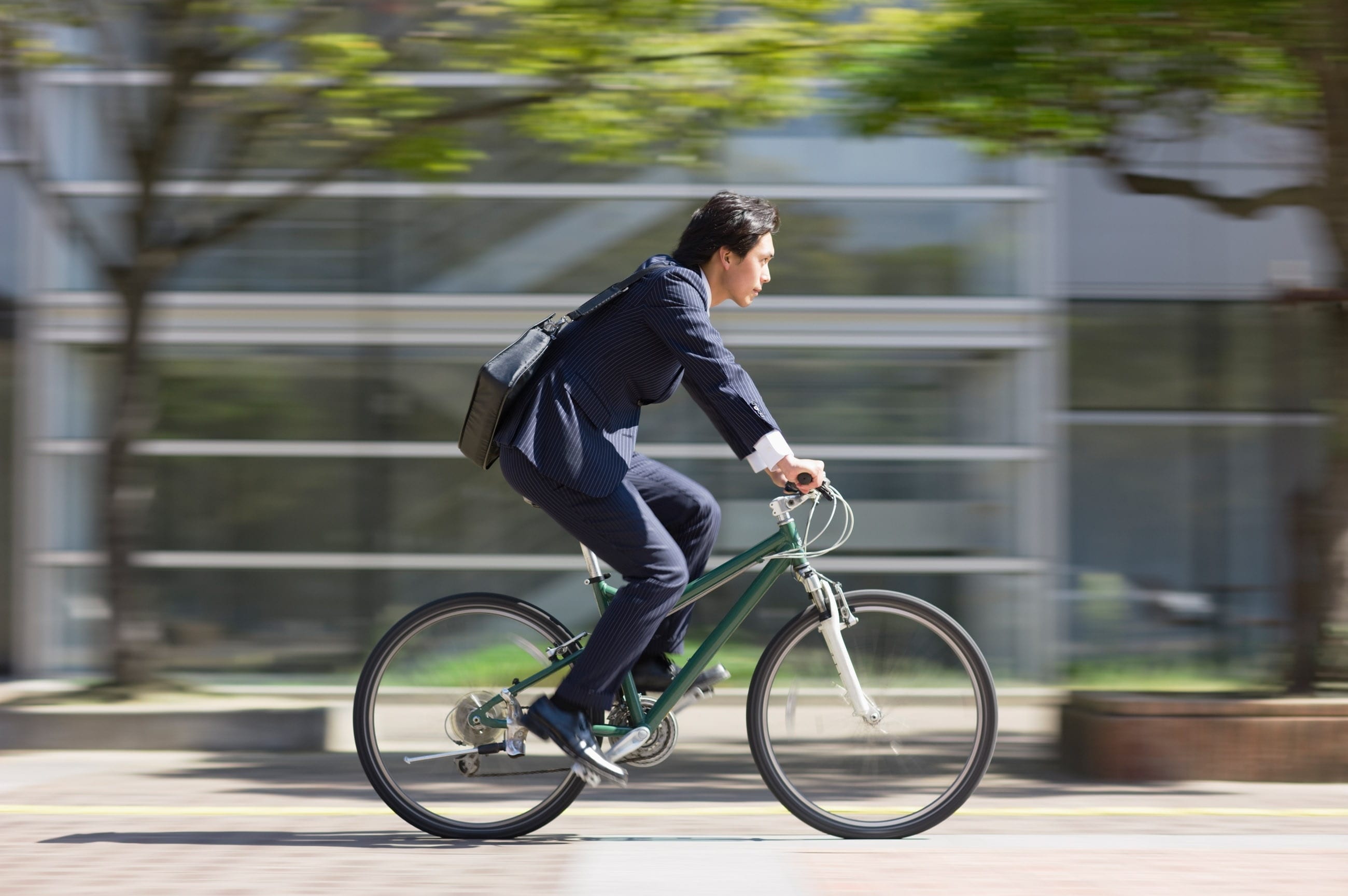 business man on a bike